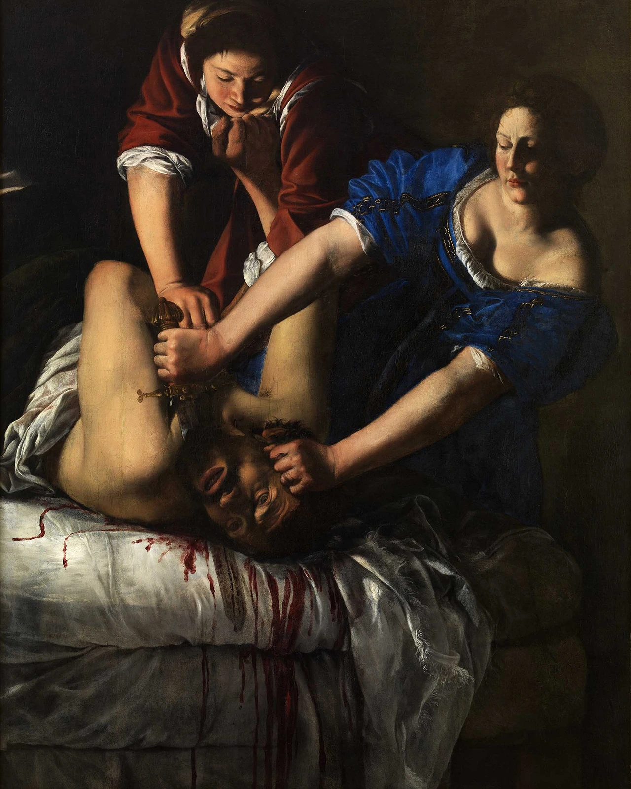 Giuditta che decapita Oloferne di Artemisia Gentileschi, scena intensa con colori forti e drammatici, realismo caravaggesco